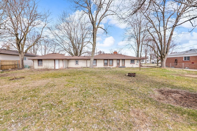 22810 E 13 Mile Rd, Saint Clair Shores, MI 48082 - view of front of house featuring a fire pit and a chimney