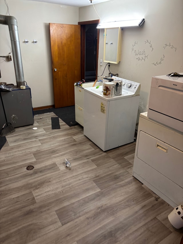 22810 E 13 Mile Rd, Saint Clair Shores, MI 48082 - laundry area with washer and dryer and light wood-type flooring