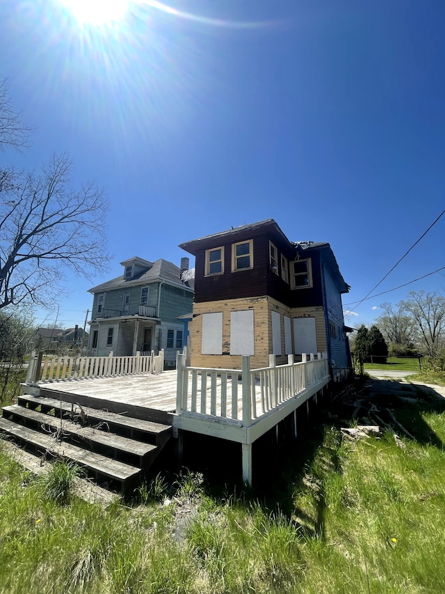 rear view of house with a deck