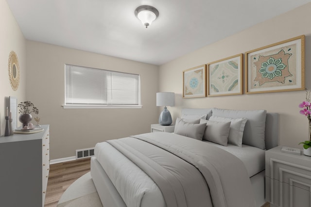 bedroom with light hardwood / wood-style flooring