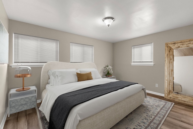 bedroom featuring light hardwood / wood-style floors