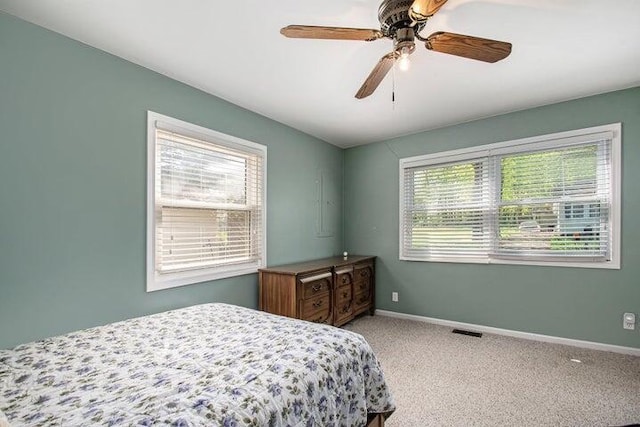 bedroom featuring ceiling fan and carpet floors