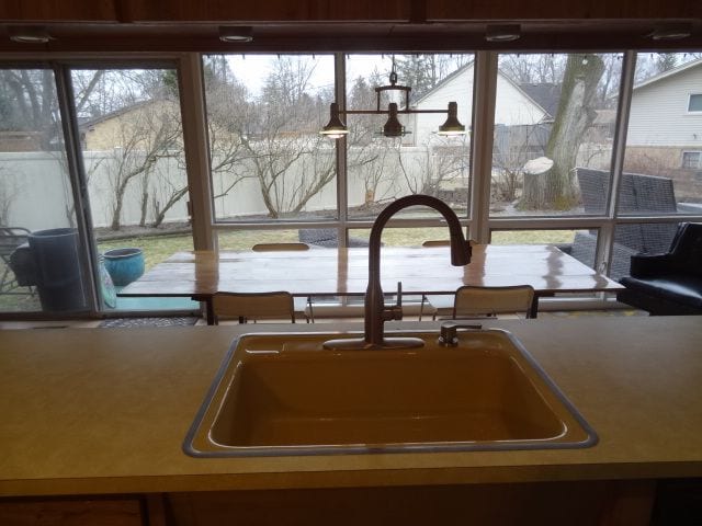 kitchen featuring plenty of natural light and sink