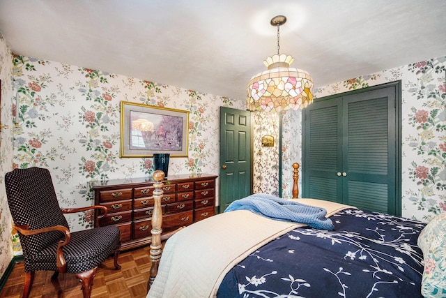 bedroom featuring parquet flooring