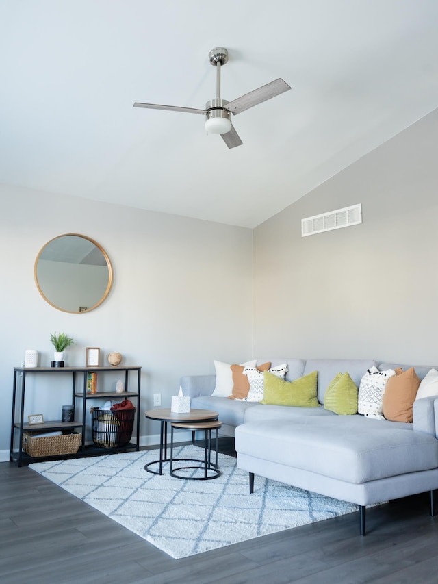 living room with vaulted ceiling, ceiling fan, and hardwood / wood-style floors