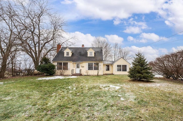 view of front of house with a front lawn