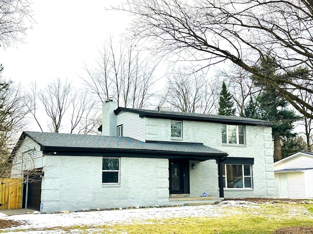 view of front of home with a garage