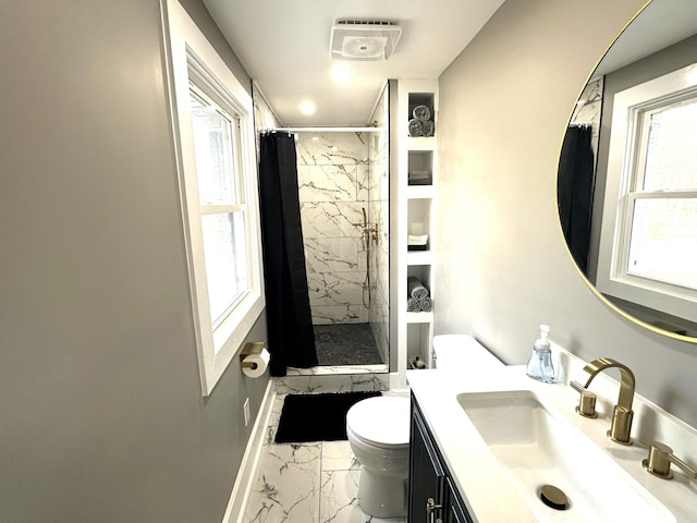 bathroom with vanity, toilet, and a shower with shower curtain