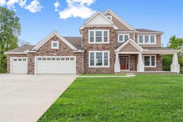 craftsman-style home with a garage and a front yard