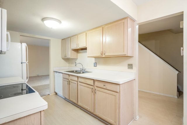 26889 Farmbrook Villa Dr, Southfield, MI 48034 - kitchen featuring light brown cabinets, white appliances, light wood finished floors, and light countertops