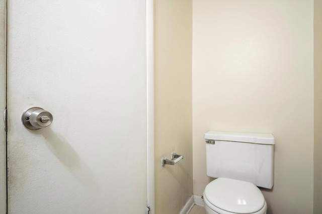 26889 Farmbrook Villa Dr, Southfield, MI 48034 - bathroom with toilet and baseboards