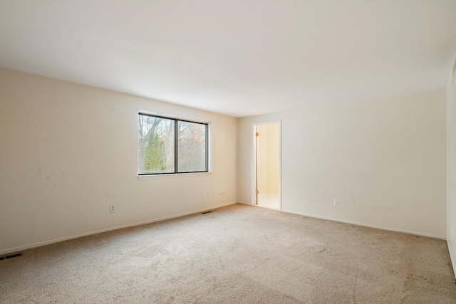 26889 Farmbrook Villa Dr, Southfield, MI 48034 - carpeted empty room with baseboards