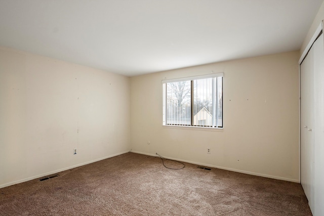 26889 Farmbrook Villa Dr, Southfield, MI 48034 - spare room featuring carpet floors and baseboards