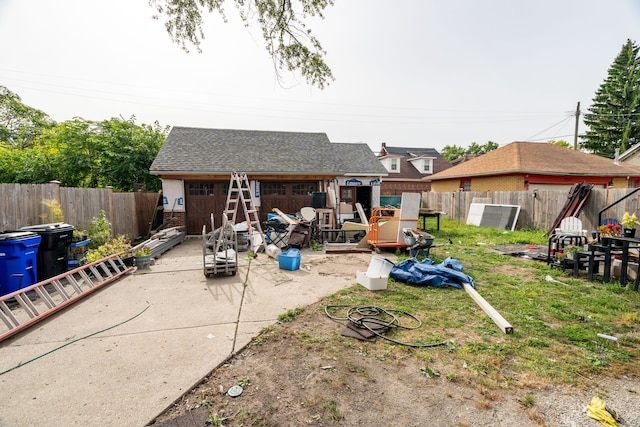 rear view of house with an outbuilding