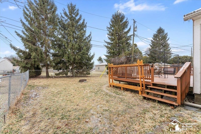 view of yard with a wooden deck