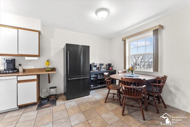 view of tiled dining space