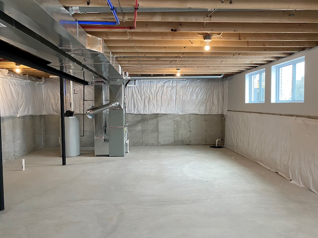 53188 Woodland Mdws, Chesterfield, MI 48047 - basement featuring gas water heater and heating unit