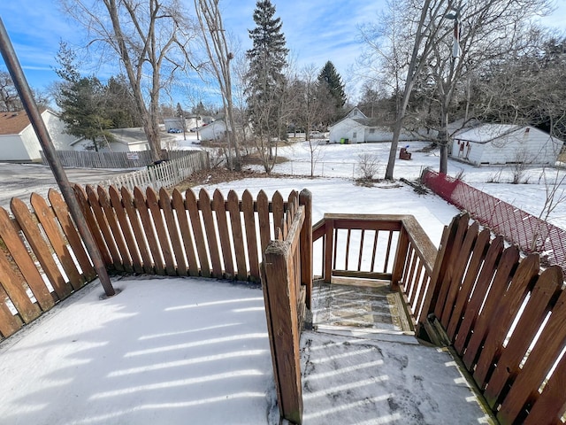 view of snow covered deck