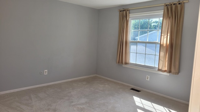 view of carpeted spare room