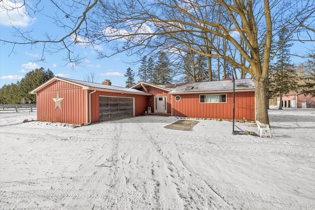 single story home featuring a garage