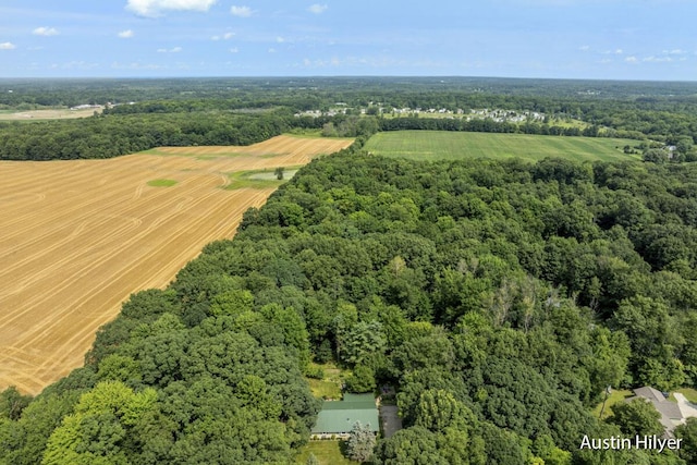 birds eye view of property featuring a rural view