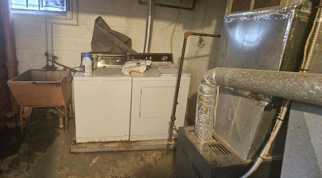 laundry room featuring sink and washing machine and dryer