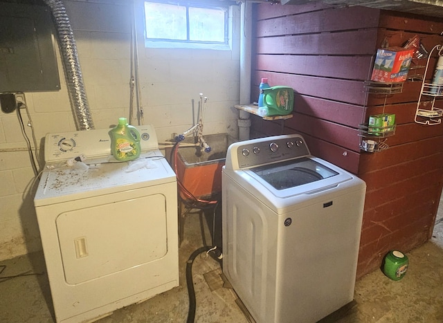 laundry room with separate washer and dryer