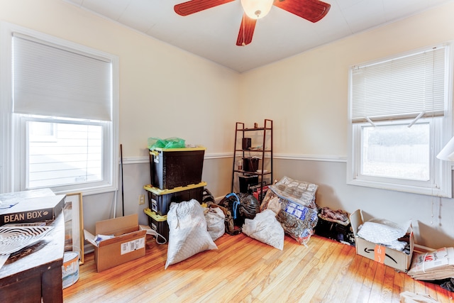 game room featuring ceiling fan and light wood-type flooring