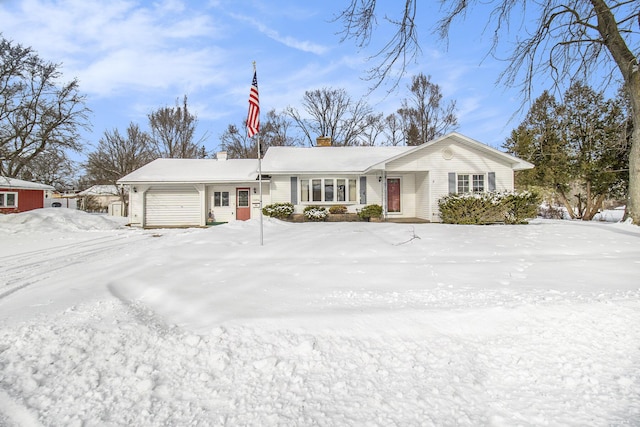 single story home with a garage