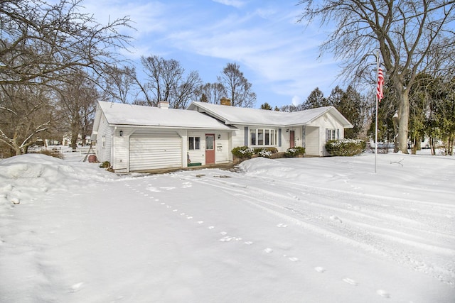 single story home with a garage