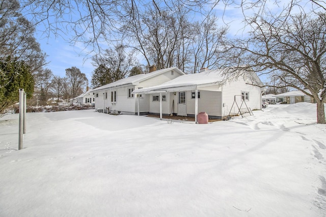 view of snow covered property