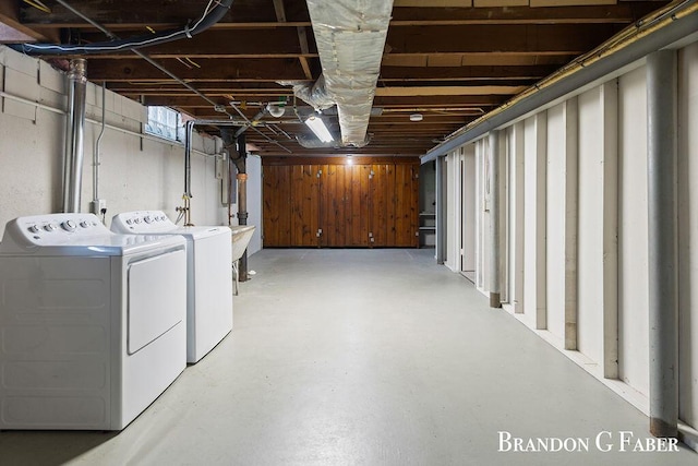 basement featuring washer and dryer