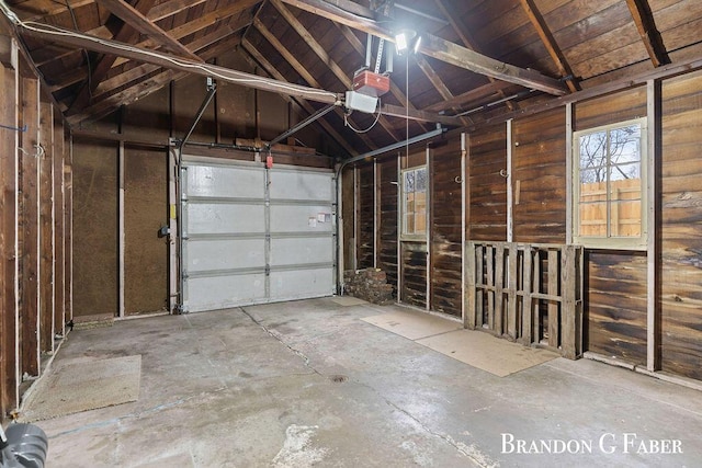 garage featuring a garage door opener