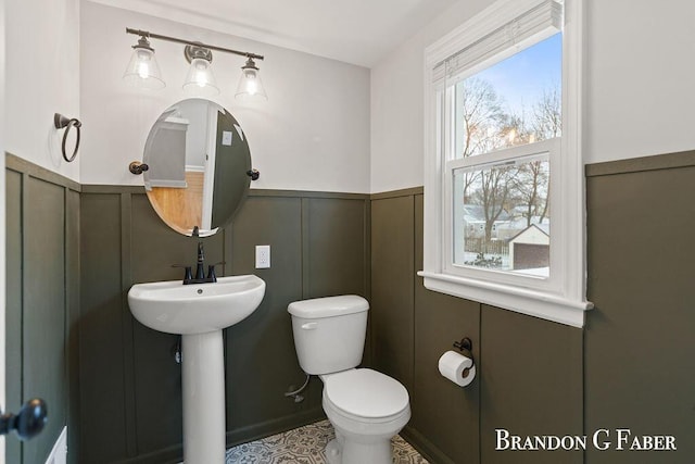 bathroom with toilet and sink