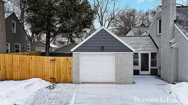 view of snow covered garage