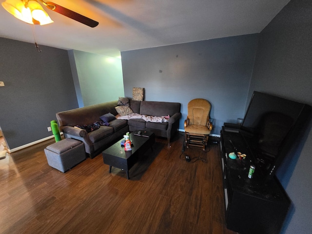 living room with hardwood / wood-style floors and ceiling fan