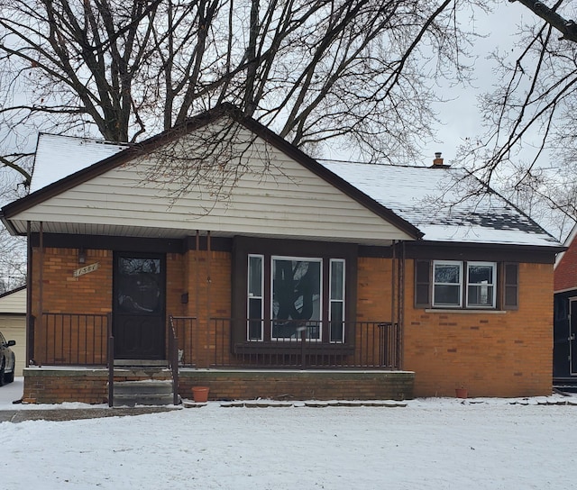 bungalow-style home featuring a garage