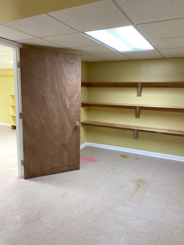 basement with a drop ceiling