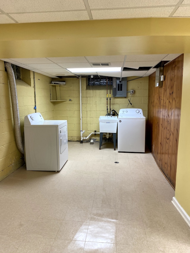 laundry area featuring sink and washing machine and clothes dryer