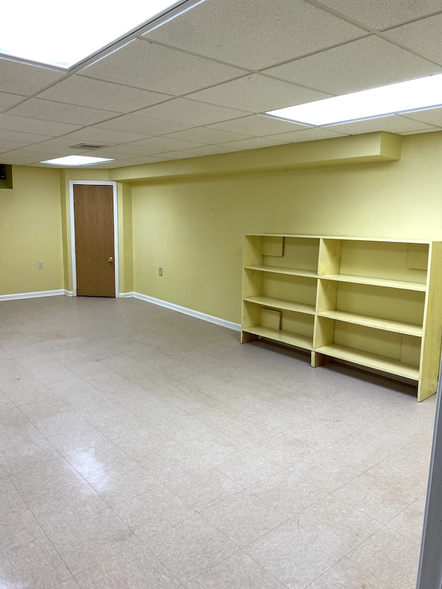 basement with a drop ceiling