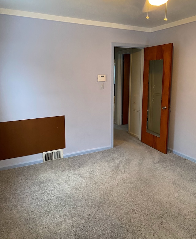 empty room featuring carpet flooring