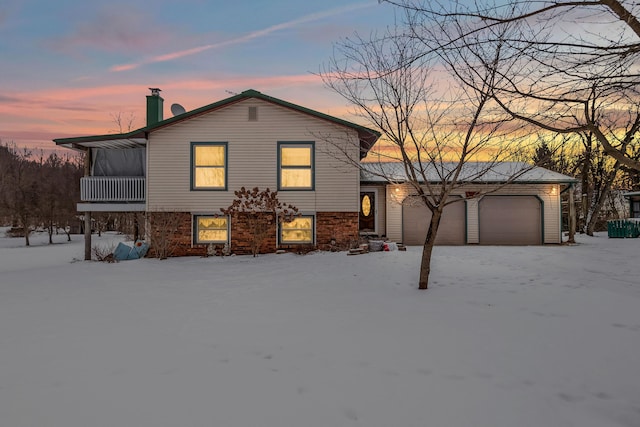 split level home with a garage