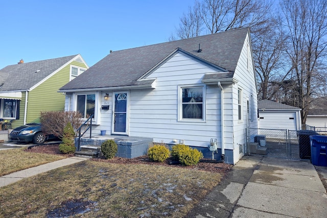 bungalow-style house featuring a garage