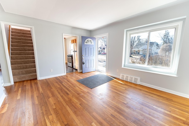 entryway with light hardwood / wood-style floors