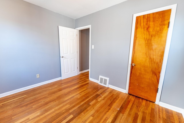 unfurnished bedroom with light hardwood / wood-style flooring