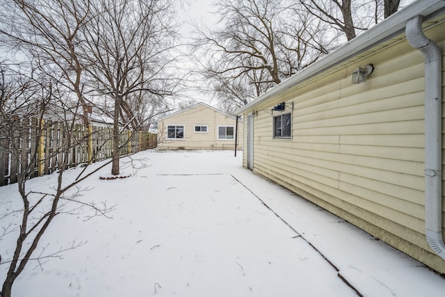 view of yard covered in snow