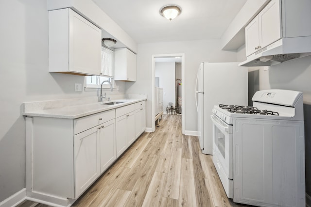 kitchen featuring white cabinetry, white gas range, sink, and light hardwood / wood-style floors