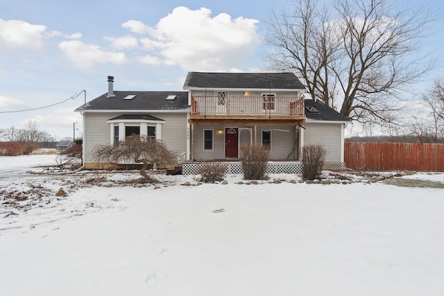 view of front of house with a balcony