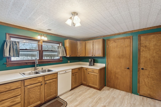 kitchen with white dishwasher, sink, crown molding, and light hardwood / wood-style flooring