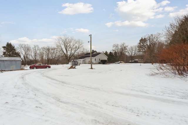 view of yard covered in snow